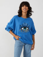 <img ="Evil Eye_Sweatshirt.png" alt="Evil Eye Sweatshirt Overzised Blue Color gold sequences"